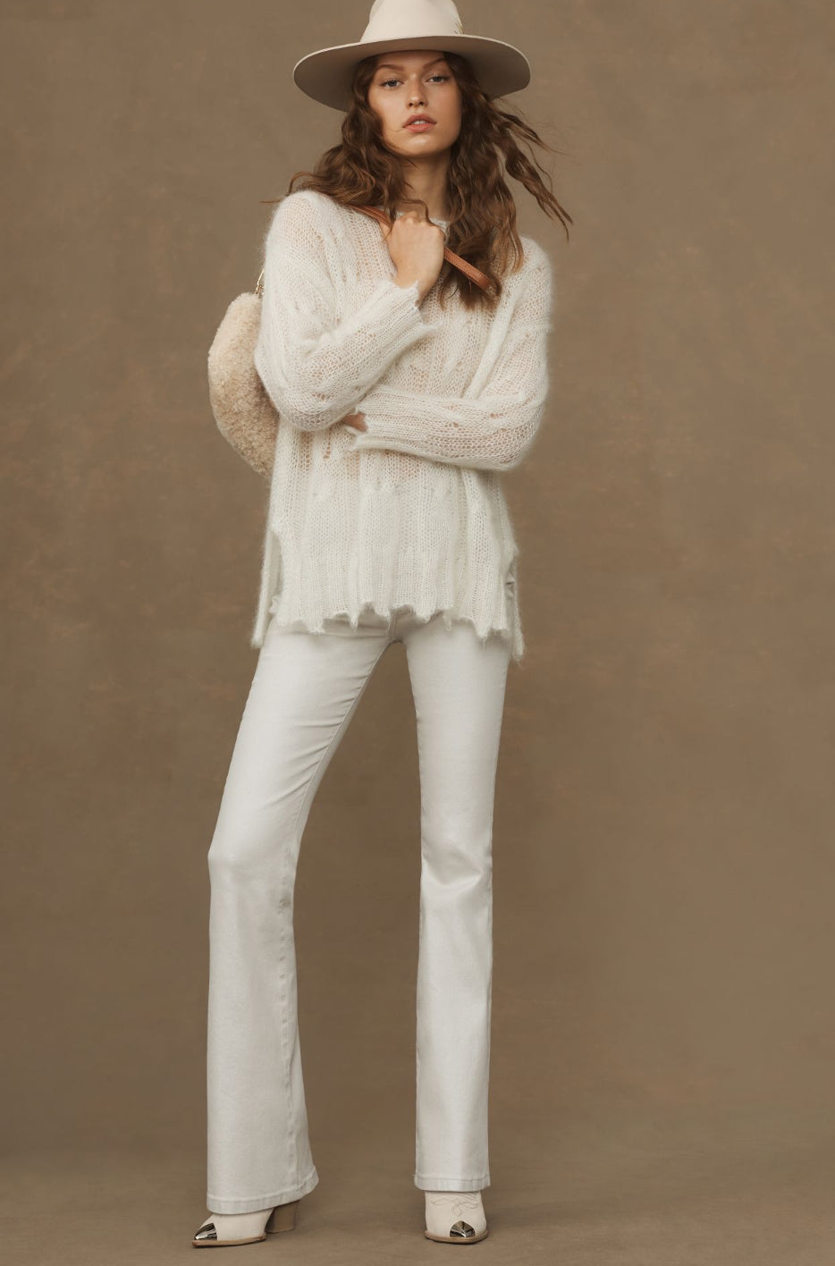 The Icon Pearlescent High-Rise Flare Jeans by Pilcro