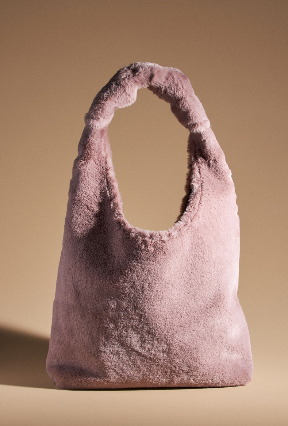 By Anthropologie Faux Fur Knotted Bag